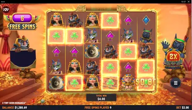 3 Tiny Gods Bonanza free spins screenshot showing the Total Win Multiplier and an Anubis Multiplier symbol