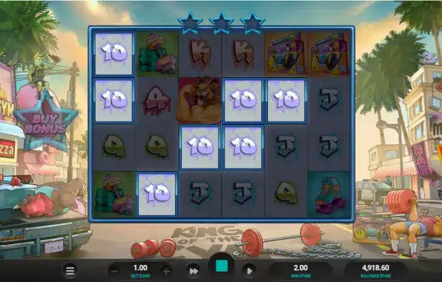 Beast Mode base game showing the 6x4 grid, graffiti card symbols, the flexing lion and the Buy Bonus star