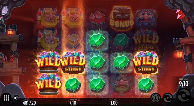 Rocket Fellas Inc free spins showing sticky wilds turning a reel Hot