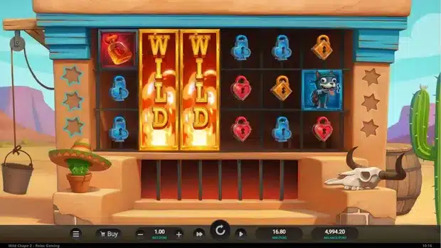Wild Chapo 2 base game showing two Dynamite Wilds mid re-spin